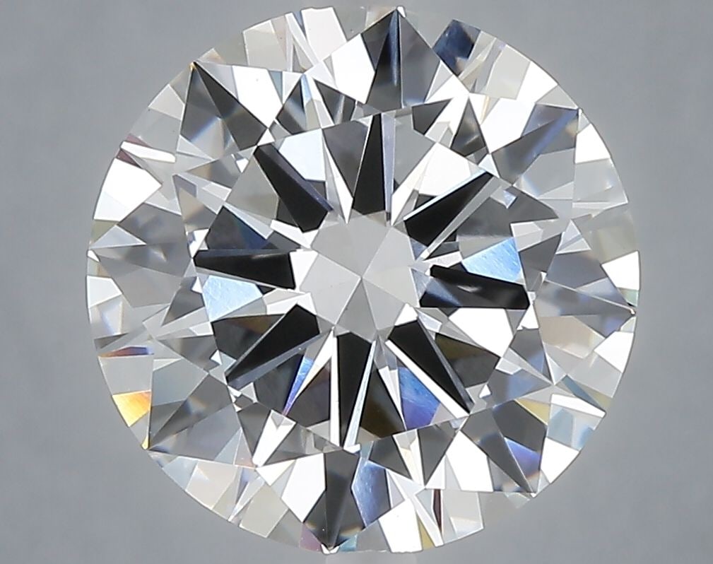 IGI Round 5.02ct E VVS2 Loose Lab Diamond: IGI Round 5.02ct E VVS2 Loose Lab Diamond A stunning 5.02 carat, EX cut lab-grown diamond boasts exceptional clarity and color, earning its VVS2 grade from the IGI. Its EX polish and symmetry ensure m