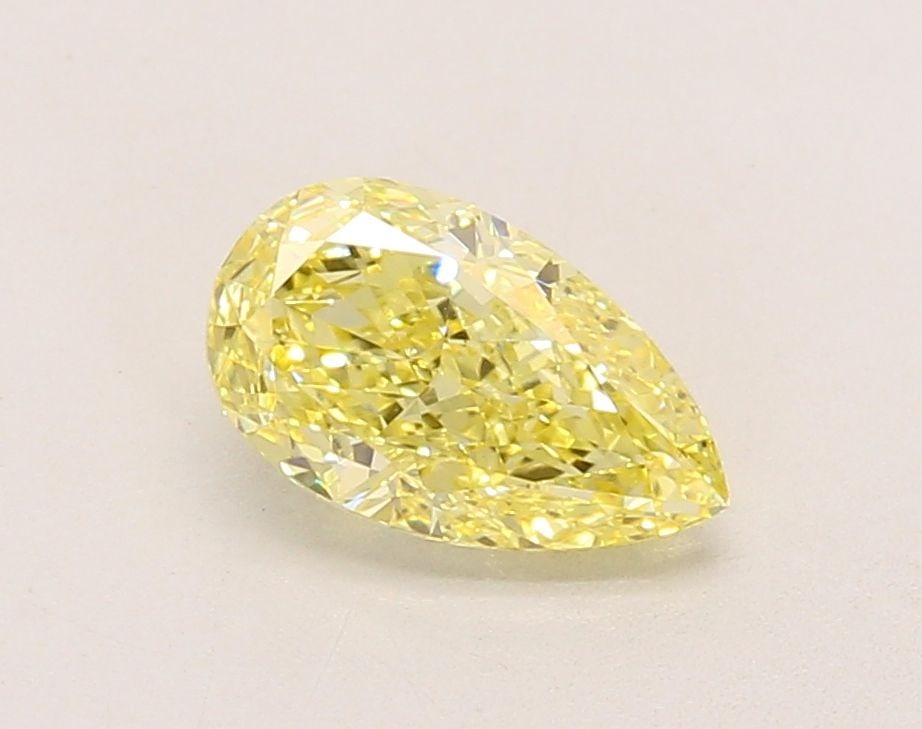 Loose Lab Diamond - IGI Pear 1.19ct Fancy Intense Yellow VVS2: Loose Lab Diamond - IGI Pear 1.19ct Fancy Intense Yellow VVS2 Experience the vibrant warmth of a lab-grown Fancy Intense Yellow diamond, boasting exceptional clarity and cut quality in this 1.19ct