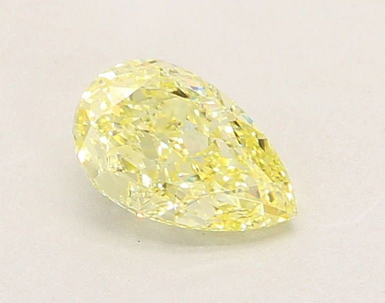 Loose Lab Diamond - IGI Pear 1.1ct Fancy Intense Yellow VVS2: Loose Lab Diamond - IGI Pear 1.1ct Fancy Intense Yellow VVS2 Experience the vibrant warmth of a genuine lab-grown diamond, boasting an exceptional 1.1ct Fancy Intense Yellow color and VVS2 clarity.