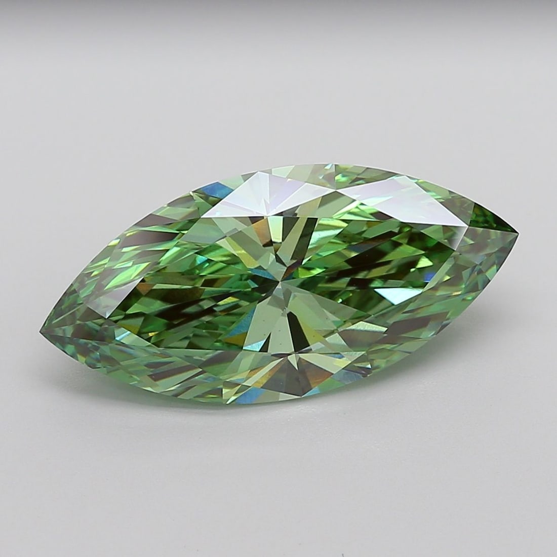 IGI Marquise 8.05ct Fancy Vivid Green VVS2 Loose Lab Diamond: IGI Marquise 8.05ct Fancy Vivid Green VVS2 Loose Lab Diamond Experience the breathtaking beauty of nature in a lab-grown diamond, boasting an exceptional 8.05ct Fancy Vivid Green hue that shimmers wit