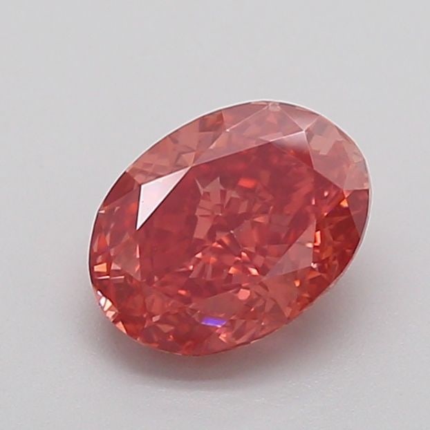 IGI Oval 1.51ct Fancy Vivid Brownish Pink VVS2 Loose Lab Diamond: IGI Oval 1.51ct Fancy Vivid Brownish Pink VVS2 Loose Lab Diamond Experience the rare beauty of a Fancy Vivid Brownish Pink diamond, with its exceptional color and clarity making it a true standout