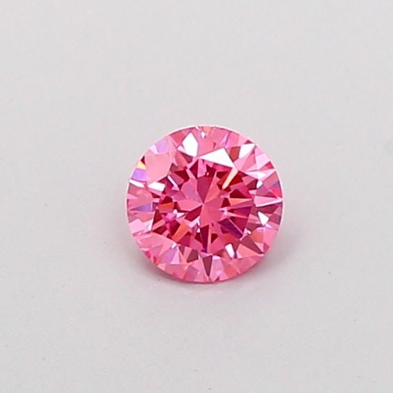 IGI Round 0.3ct Fancy Vivid Pink VVS2 Loose Lab Diamond: IGI Round 0.3ct Fancy Vivid Pink VVS2 Loose Lab Diamond Experience the rare beauty of a Fancy Vivid Pink diamond, one of the most coveted colors in diamonds. This exquisite 0.3ct lab-grown gem boasts