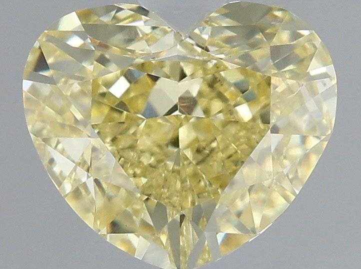 Loose Lab Diamond - IGI Heart 1.53ct Fancy Intense Yellow VVS2: Loose Lab Diamond - IGI Heart 1.53ct Fancy Intense Yellow VVS2 Experience the vibrant beauty of nature in a lab-grown diamond, certified by the International Gemological Institute (IGI) as Fancy Inten
