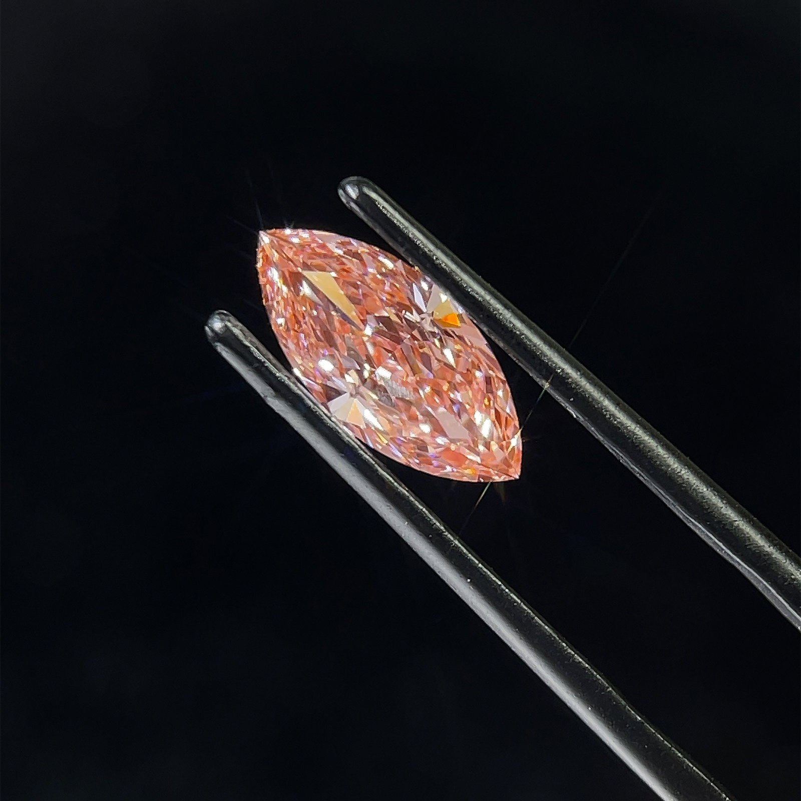 IGI Marquise 1.51ct Fancy Vivid Pink VVS2 Loose Lab Diamond: IGI Marquise 1.51ct Fancy Vivid Pink VVS2 Loose Lab Diamond Experience the unparalleled beauty of a Fancy Vivid Pink diamond, one of the rarest and most coveted colors in the world. This exquisite