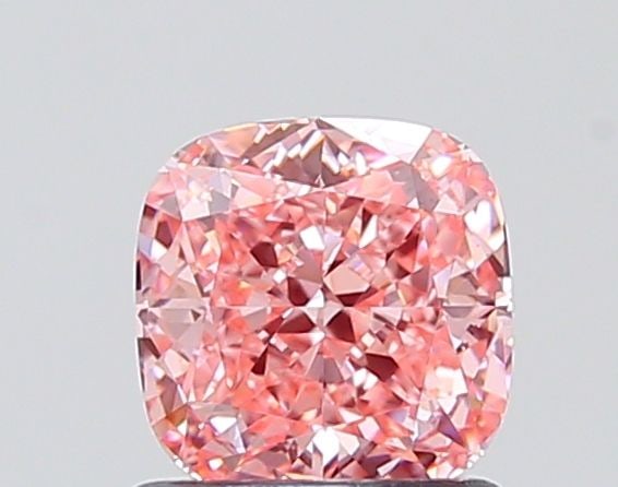 Vivid Pink VVS2 1.01ct Loose Lab Diamond Cushion Modified IGI: Vivid Pink VVS2 1.01ct Loose Lab Diamond Cushion Modified IGI Experience the rare beauty of a lab-grown Vivid Pink diamond, certified by IGI as VVS2 in clarity and EX in polish. This cushion-cut gem