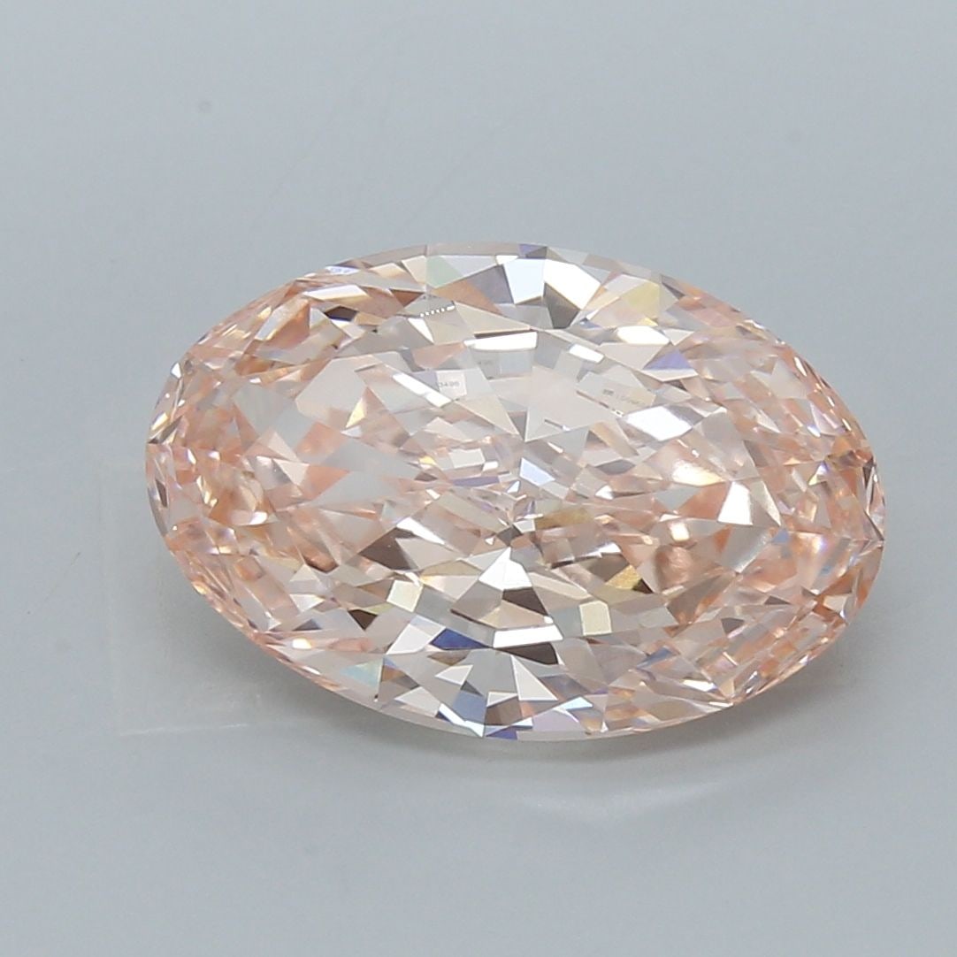 IGI Oval 7.06ct Fancy Vivid Pink VVS2 Loose Lab Diamond: IGI Oval 7.06ct Fancy Vivid Pink VVS2 Loose Lab Diamond Experience the rare beauty of a Fancy Vivid Pink diamond, one of the most coveted colors in the world of gemstones. This stunning 7.06ct lab-gro