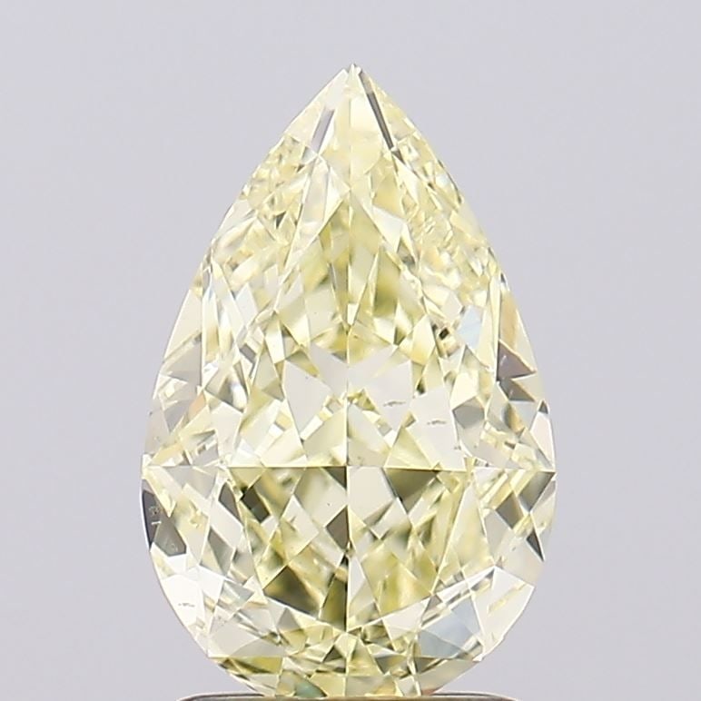 Loose Lab Diamond - IGI Pear 2.02ct Fancy Yellow VVS2: Loose Lab Diamond - IGI Pear 2.02ct Fancy Yellow VVS2 A rare and radiant gem, this 2.02ct Fancy Yellow Lab diamond boasts exceptional clarity (VVS2) and luster (EX polish), making it a true standout a