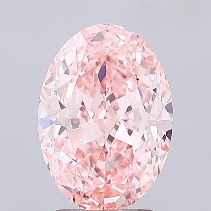 IGI Oval 3.52ct Fancy Vivid Pink VVS2 Loose Lab Diamond: IGI Oval 3.52ct Fancy Vivid Pink VVS2 Loose Lab Diamond Experience the breathtaking beauty of a lab-grown diamond, certified by IGI as Fancy Vivid Pink with exceptional clarity and cut. This stunning