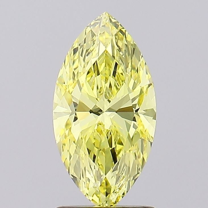 IGI Marquise 1.5ct Fancy Intense Yellow VVS2 Loose Lab Diamond: IGI Marquise 1.5ct Fancy Intense Yellow VVS2 Loose Lab Diamond A true gem for the discerning collector, this 1.5ct IGI-certified Fancy Intense Yellow VVS2 loose lab diamond boasts exceptional color an
