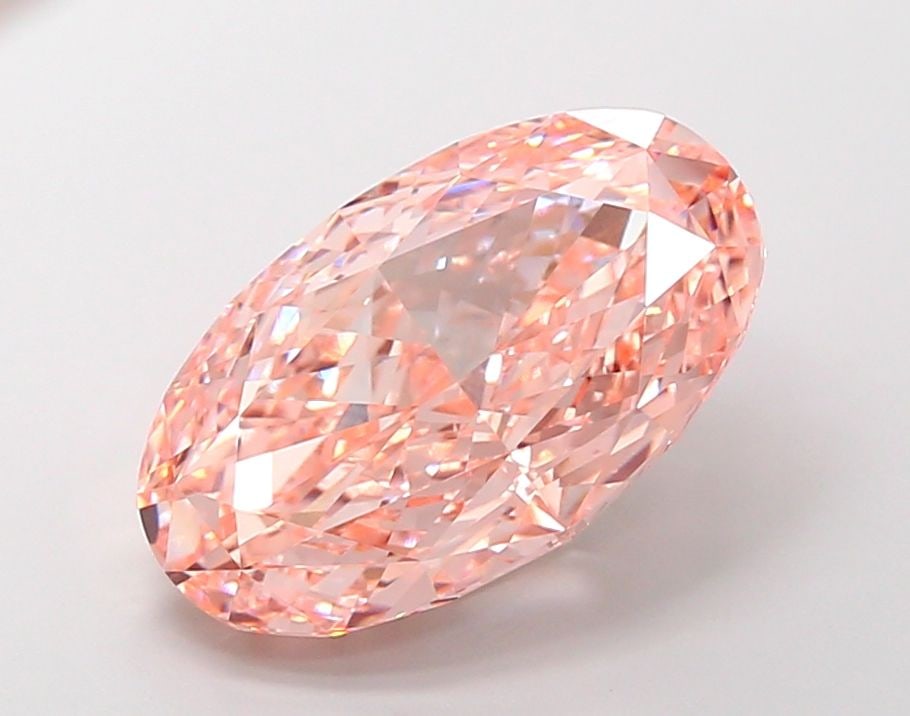 IGI Oval 10.1ct Fancy Vivid Pink VVS2 Loose Lab Diamond: IGI Oval 10.1ct Fancy Vivid Pink VVS2 Loose Lab Diamond A true gem for the discerning collector, this 10.1ct Fancy Vivid Pink VVS2 lab-grown diamond boasts exceptional color and clarity, with a vivid
