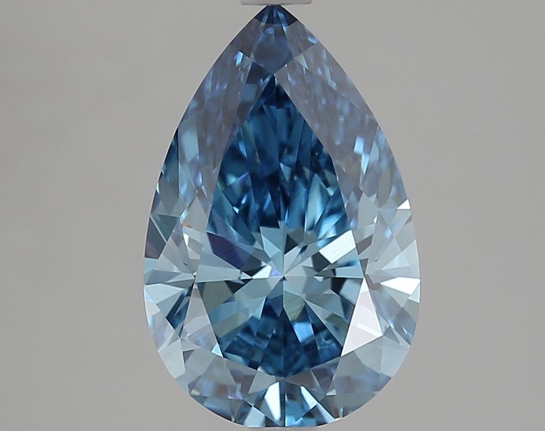 Loose Lab Diamond - IGI Pear 3.02ct Fancy Vivid Blue VVS2: Loose Lab Diamond - IGI Pear 3.02ct Fancy Vivid Blue VVS2 Experience the breathtaking beauty of a lab-grown diamond, certified by the International Gemological Institute (IGI) as Fancy Vivid Blue, wit