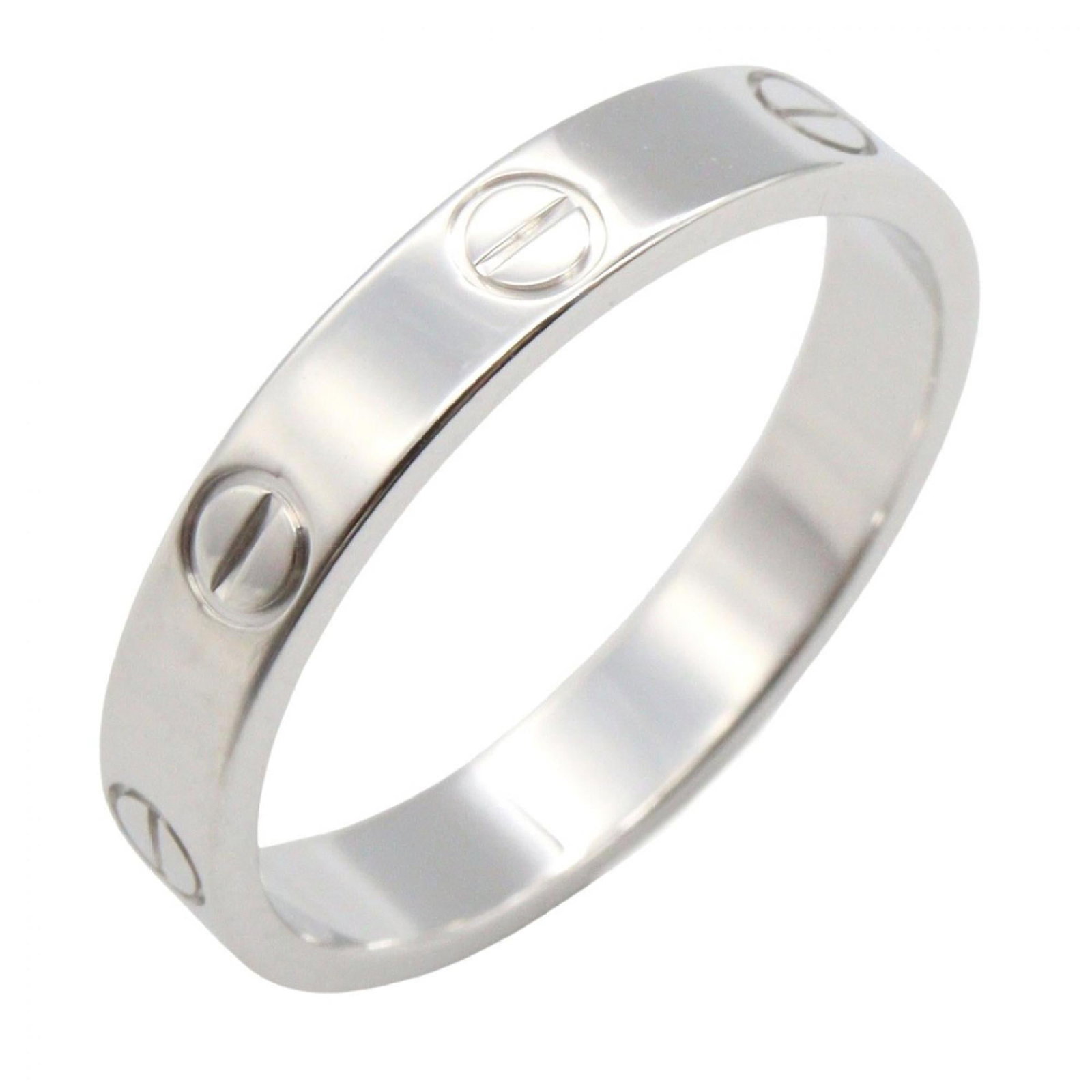 Cartier White Gold 18k Band Ring: Cartier White Gold 18k Band Ring A stunning Cartier white gold 18k band ring, perfect for making a statement, boasts the iconic luxury brand's signature style with its sleek and sophisticated design.