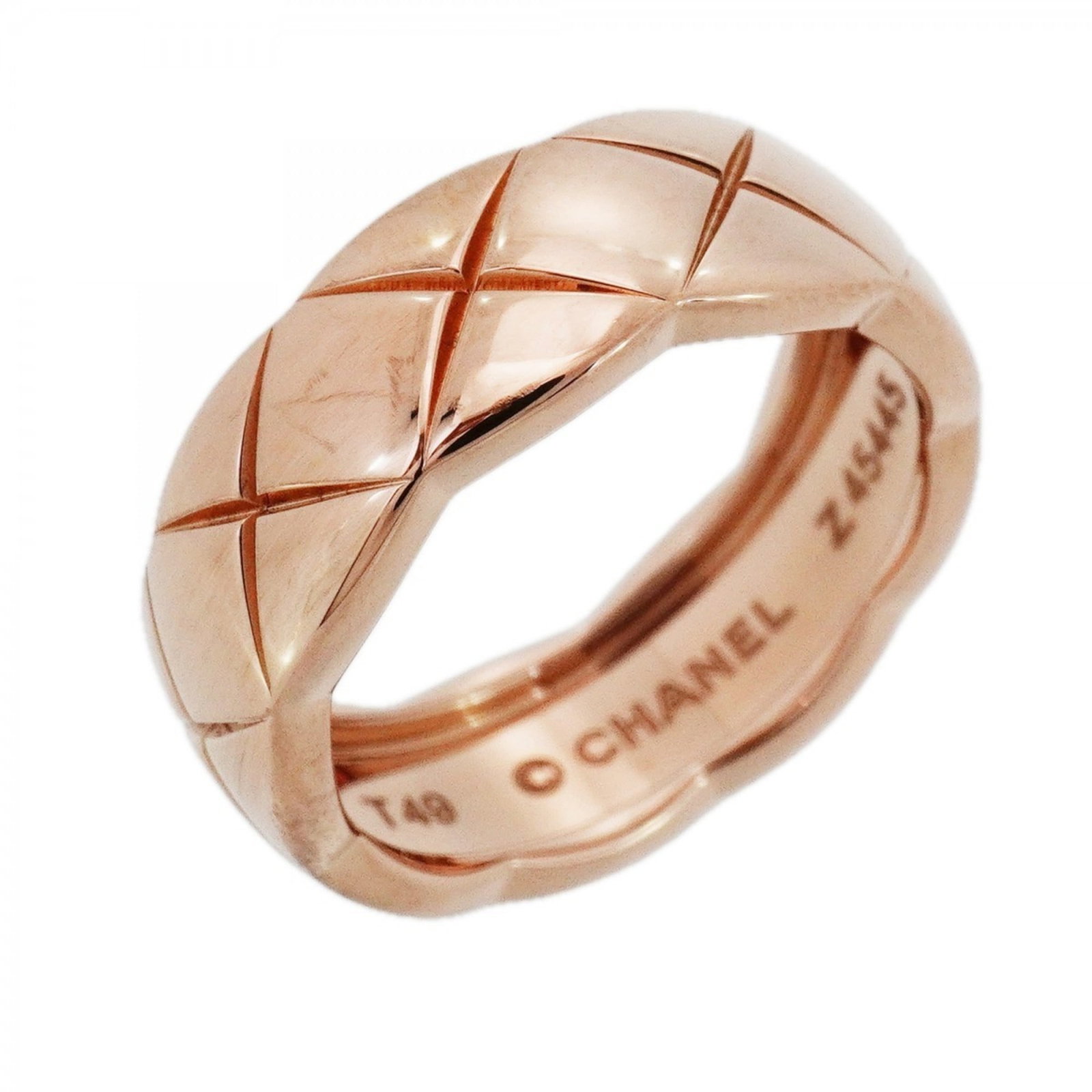 Pink Gold 18K Chanel Band Ring: Pink Gold 18K Chanel Band Ring Elevate your style with this stunning Pink Gold 18K Chanel band ring, boasting the iconic brand's signature elegance and sophistication. With its sleek design and durabl