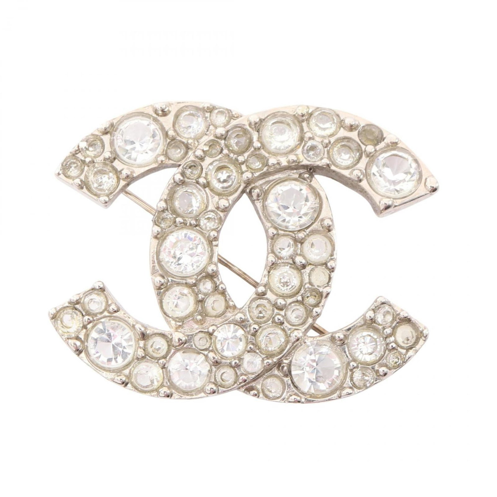 Rhinestone - Chanel Brooch Gold Plating: Rhinestone - Chanel Brooch Gold Plating Add a touch of luxury to your wardrobe with this stunning Chanel brooch, adorned with intricate gold plating and sparkling clear rhinestones. In excellent condi