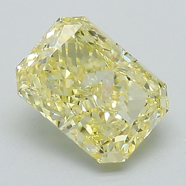 IGI Radiant 1.59ct Fancy Vivid Yellow VVS2 Loose Lab Diamond: IGI Radiant 1.59ct Fancy Vivid Yellow VVS2 Loose Lab Diamond Experience the brilliance of nature with this exquisite IGI Radiant cut lab diamond, boasting a vibrant Fancy Vivid Yellow hue and exceptio