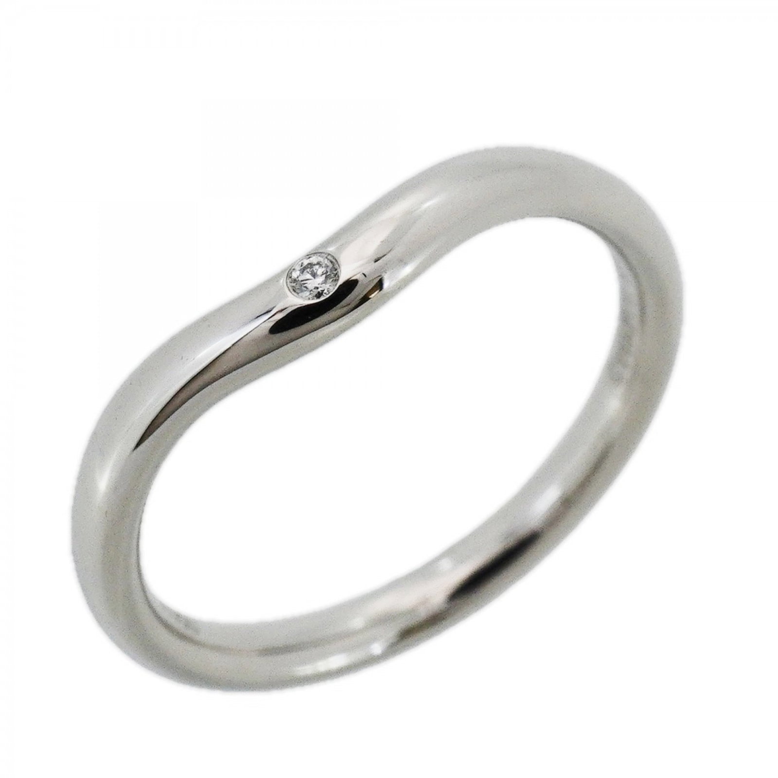 950 Tiffany Band Ring Platinum: 950 Tiffany Band Ring Platinum A stunning 950 Tiffany Band Ring Platinum, adorned with a beautiful diamond stone, adds a touch of elegance to any outfit. In excellent condition despite being worn, thi