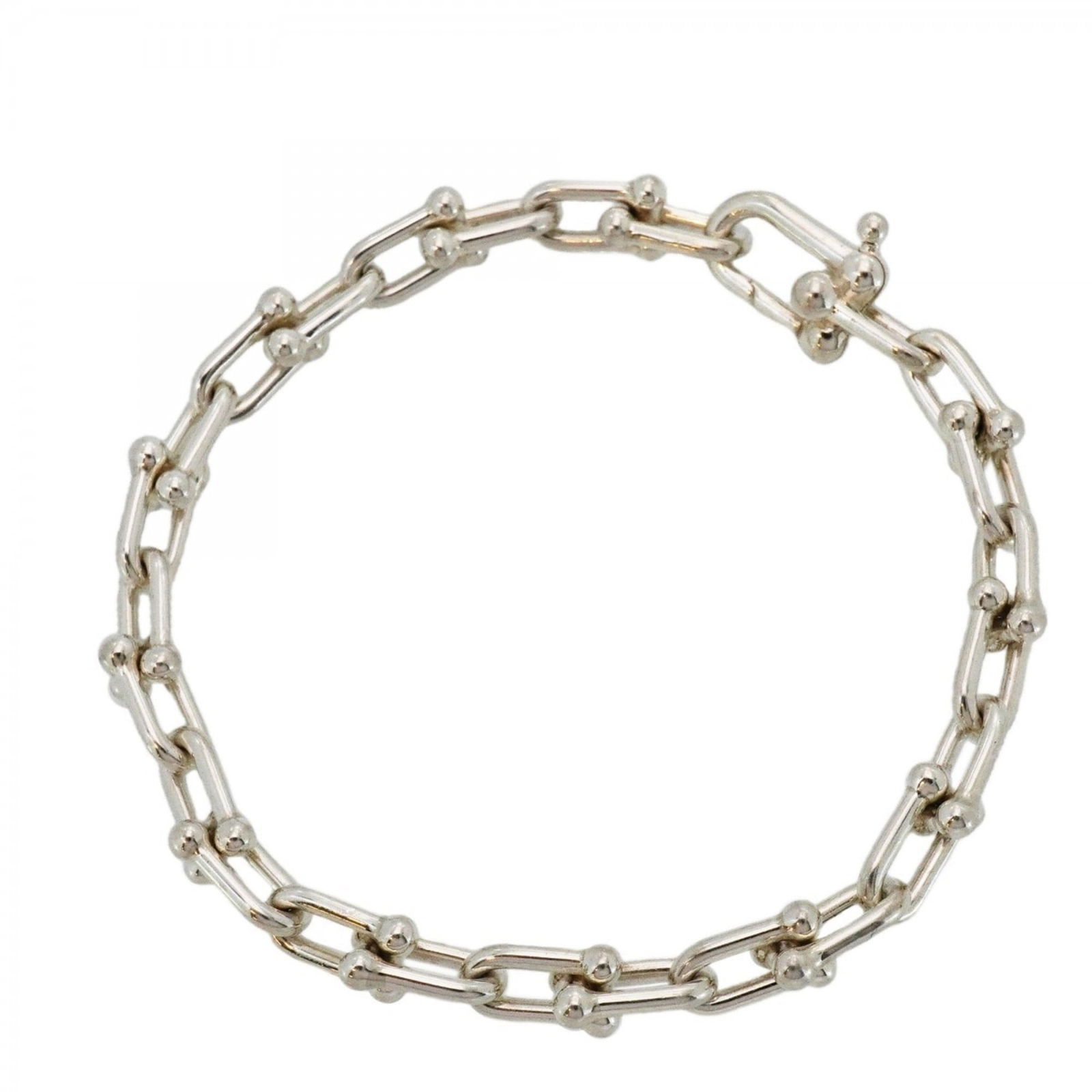 925 Tiffany Charm Bracelet Silver: 925 Tiffany Charm Bracelet Silver A timeless piece of elegance, this 925 Tiffany charm bracelet is crafted from sterling silver and boasts a classic design that exudes sophistication. With its 16.5cm