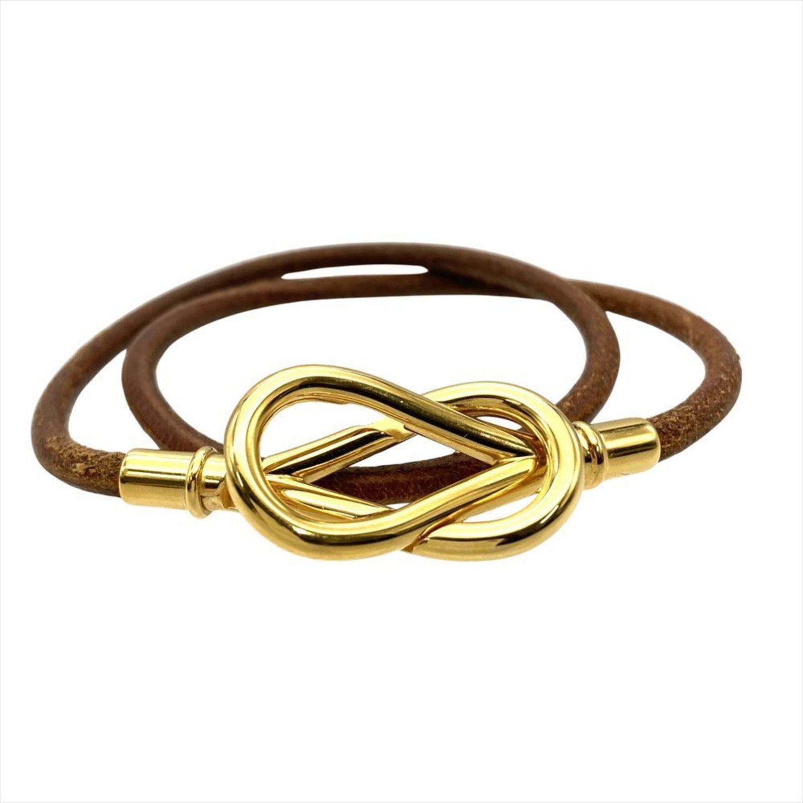 Hermes Leather Charm Bracelet: Hermes Leather Charm Bracelet A timeless and sophisticated accessory, this Hermes leather charm bracelet boasts rich brown leather and a classic design that exudes elegance. With its 41cm length and v