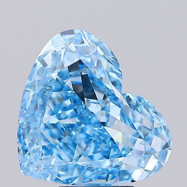 IGI Heart 5.01ct Fancy Vivid Blue VVS2 Loose Lab Diamond: IGI Heart 5.01ct Fancy Vivid Blue VVS2 Loose Lab Diamond Experience the rare beauty of a Fancy Vivid Blue diamond, one of the most unique and coveted colors in the world of diamonds. This stunning 5.0