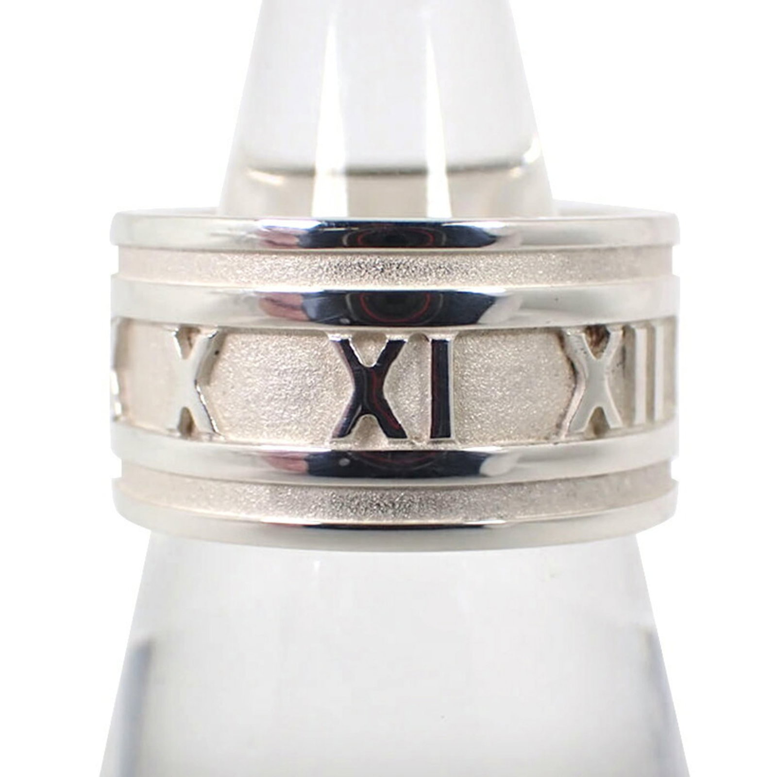 Sterling Silver 925 Tiffany Band Ring: Sterling Silver 925 Tiffany Band Ring A stunning sterling silver band ring from Tiffany & Co., this 925 piece is crafted with timeless elegance and sophistication, perfect for everyday wear. With its