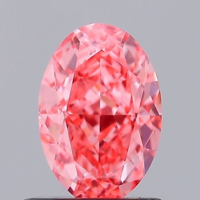 IGI Oval 1.02ct Fancy Vivid Pink VVS2 Loose Lab Diamond: IGI Oval 1.02ct Fancy Vivid Pink VVS2 Loose Lab Diamond Experience the rare beauty of a Fancy Vivid Pink diamond, one of the most coveted colors in the world of gemstones. This exquisite 1.02ct lab-gr