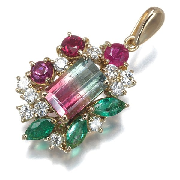 Bicolortourmaline 1.36ct Emerald & Ruby Pendant with 0.55ct Diamond: Bicolortourmaline 1.36ct Emerald & Ruby Pendant with 0.55ct Diamond A stunning 1.36ct Bicolour Tourmaline pendant, set with a vibrant combination of emerald and ruby hues, is paired with a delicate 0.