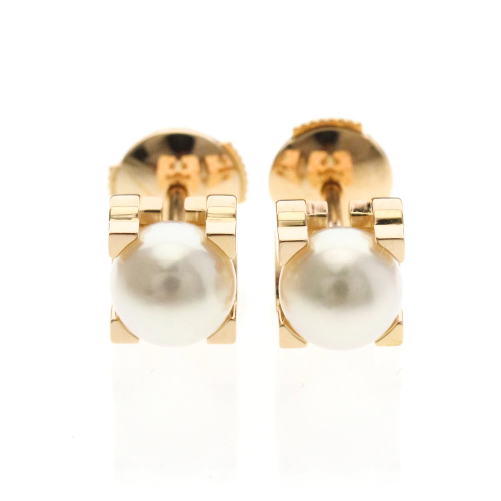 Pink Gold 18K Cartier Stud Earrings: Pink Gold 18K Cartier Stud Earrings Elevate your style with these stunning 18K pink gold Cartier stud earrings, adorned with a beautiful pearl stone that adds a touch of elegance to any outfit. The su