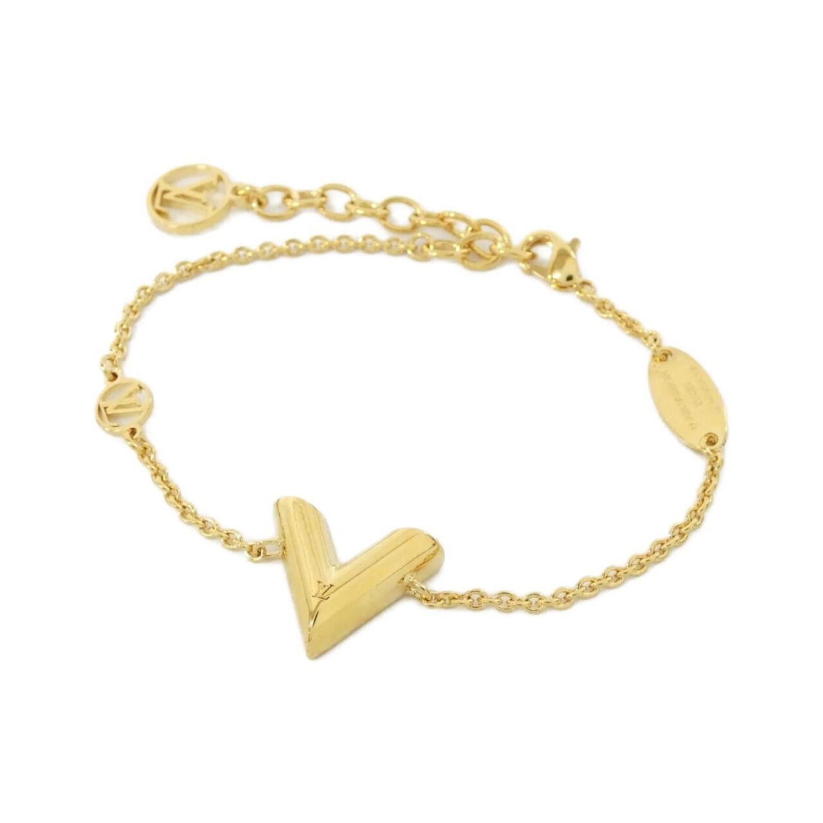Bracelet Louis Vuitton Charm: Bracelet Louis Vuitton Charm Add a touch of luxury to your style with this pre-loved Louis Vuitton charm bracelet, featuring the iconic monogram pattern in gold. With its adjustable length and delicat