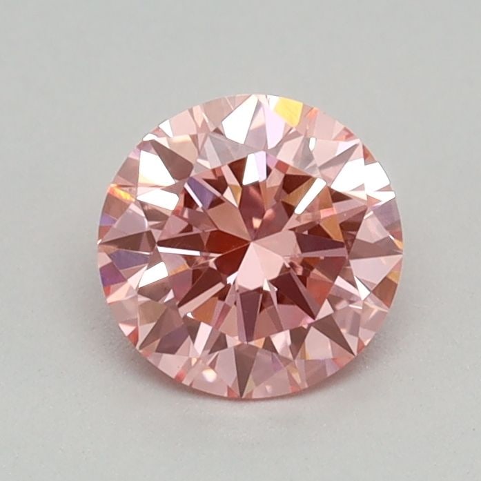 IGI Round 0.39ct Fancy Vivid Pink VVS2 Loose Lab Diamond: IGI Round 0.39ct Fancy Vivid Pink VVS2 Loose Lab Diamond Experience the breathtaking beauty of a lab-grown fancy vivid pink diamond, certified by the International Gemological Institute (IGI) as VVS2