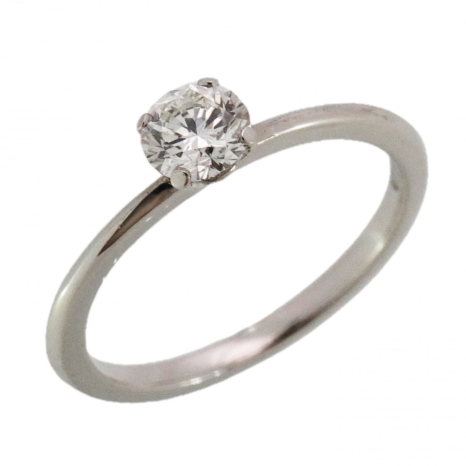 950 Tiffany Band Ring Platinum: 950 Tiffany Band Ring Platinum A stunning 950 Tiffany Band Ring Platinum, adorned with a beautiful diamond stone, adds a touch of elegance to any outfit. In excellent condition despite being worn, thi