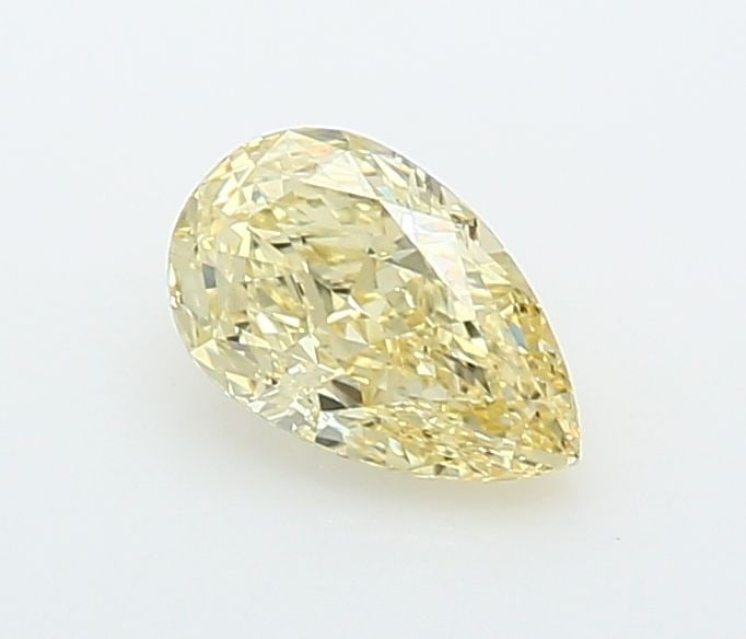 Loose Lab Diamond - IGI Pear 1.01ct Fancy Yellow VVS2: Loose Lab Diamond - IGI Pear 1.01ct Fancy Yellow VVS2 A rare and radiant gem, this 1.01ct Fancy Yellow Lab Diamond boasts exceptional clarity (VVS2) and polish (EX), giving it a dazzling appearance
