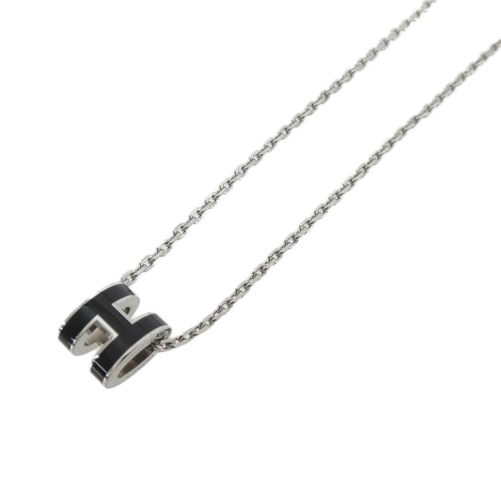 Hermes Mini Pop Necklace (147992FP): Hermes Mini Pop Necklace (147992FP) Elevate your style with the iconic Hermes Mini Pop Necklace, boasting sleek black and silver tones that exude sophistication. This petite yet powerful piece is perf