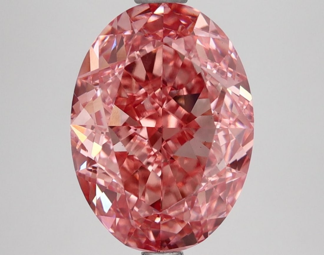IGI Oval 5.13ct Fancy Vivid Pink VVS2 Loose Lab Diamond: IGI Oval 5.13ct Fancy Vivid Pink VVS2 Loose Lab Diamond Experience the rare beauty of a Fancy Vivid Pink diamond, one of the most coveted colors in the world of gemstones. This stunning 5.13ct lab-gro