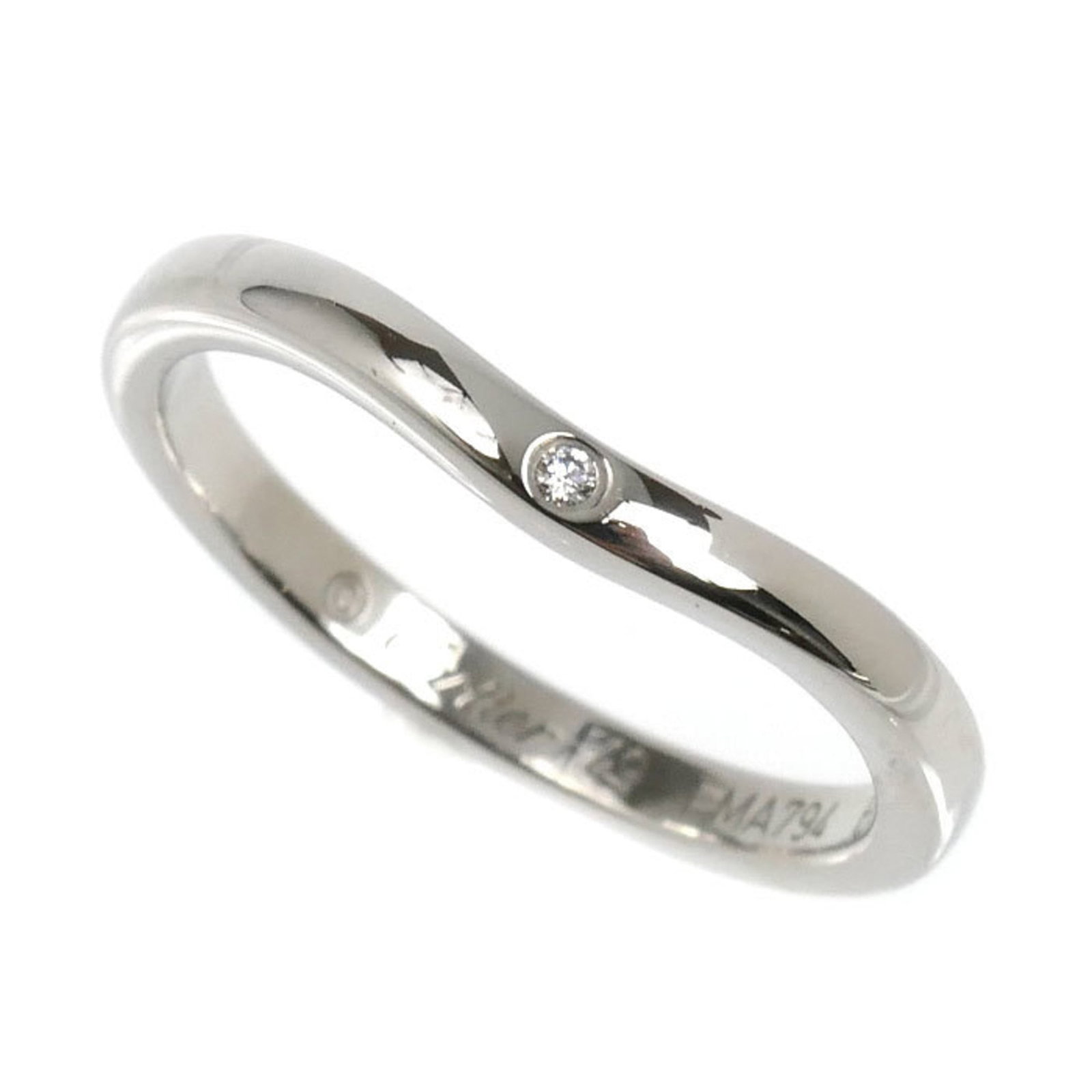 Cartier Platinum 950 Band Ring: Cartier Platinum 950 Band Ring A stunning Cartier Platinum 950 band ring, set with a diamond and crafted from luxurious platinum, adds a touch of timeless elegance to any outfit. With its classic desi