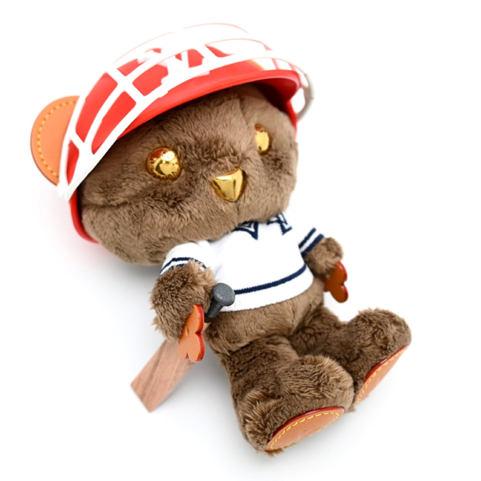 Louis Vuitton Leather Handbag Charm: Louis Vuitton Leather Handbag Charm A vibrant multi-color leather charm from the iconic Louis Vuitton brand, adding a touch of luxury to any handbag or keychain. With its durable leather construction