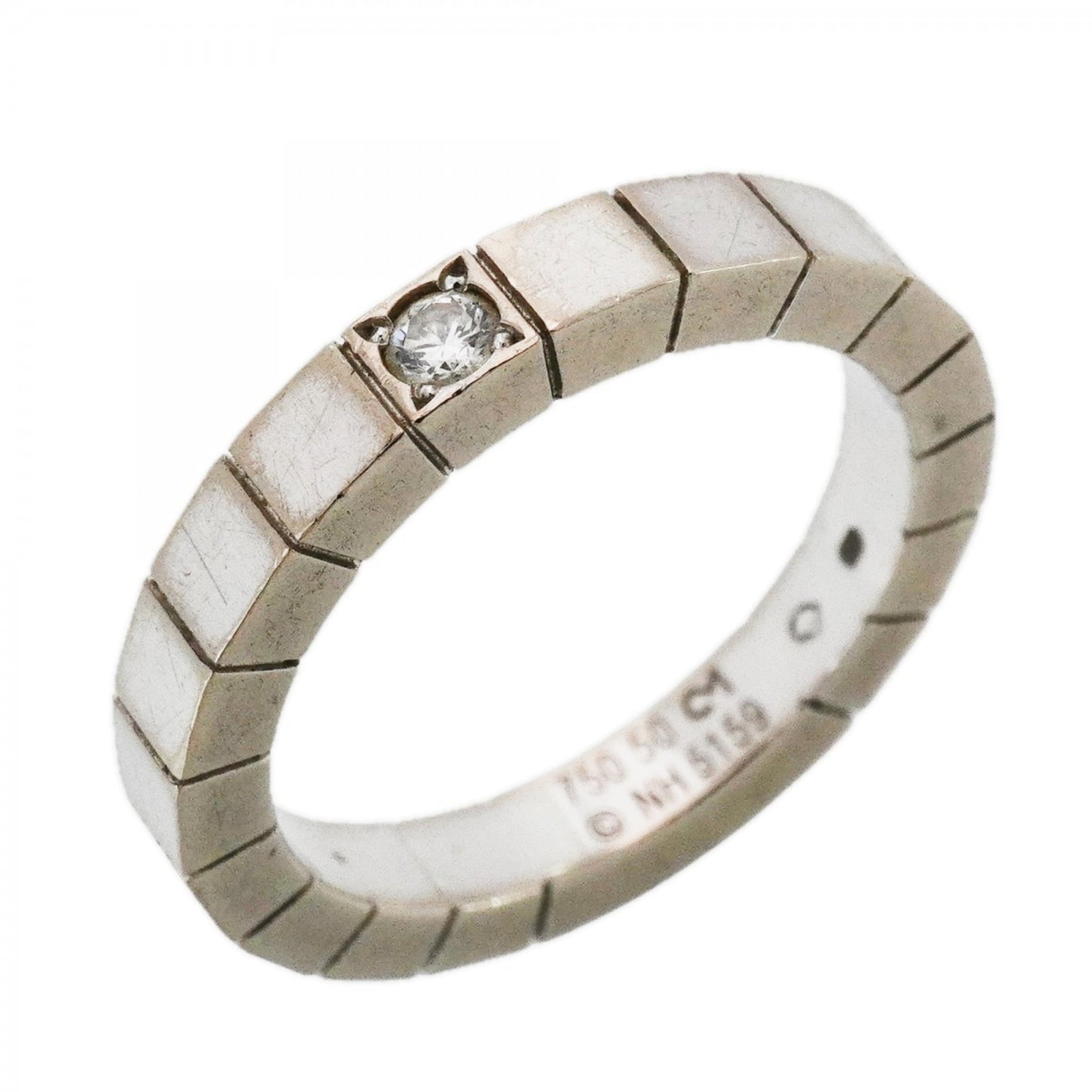 Cartier 18k White Gold Band Ring: Cartier 18k White Gold Band Ring A stunning Cartier band ring in 18k white gold, adorned with a diamond stone, adds a touch of elegance to any outfit. With its classic design and premium materials, th