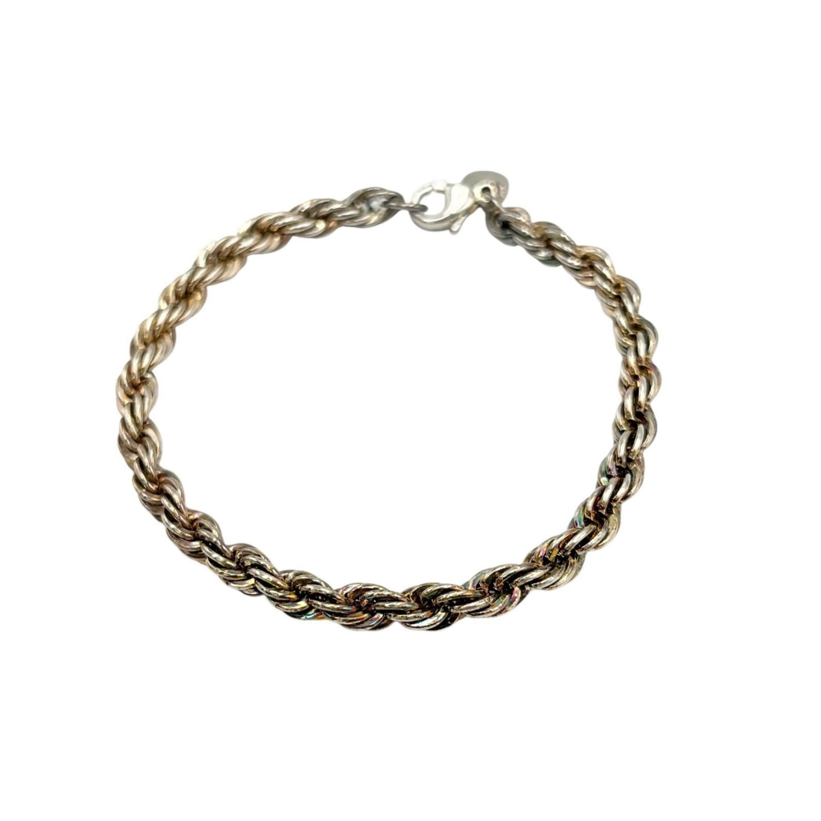 925 Tiffany Charm Bracelet Silver: 925 Tiffany Charm Bracelet Silver A stunning 925 Tiffany charm bracelet in sterling silver, perfect for adding a touch of elegance to any outfit. With its classic design and durable construction, this