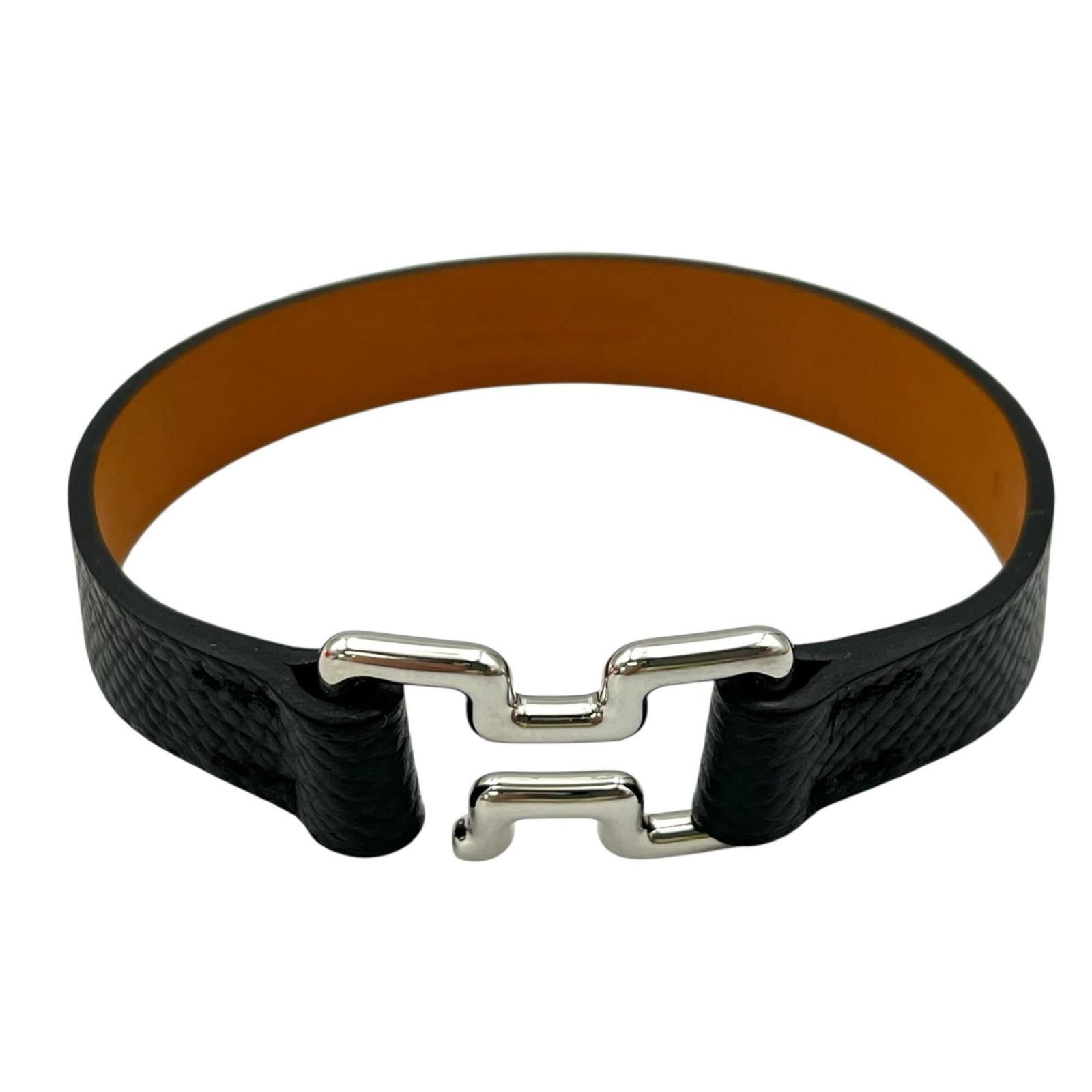 Hermes Leather Charm Bracelet: Hermes Leather Charm Bracelet A sleek and sophisticated accessory for the modern gentleman, this classic Hermes leather charm bracelet boasts a timeless black finish that adds a touch of elegance to a
