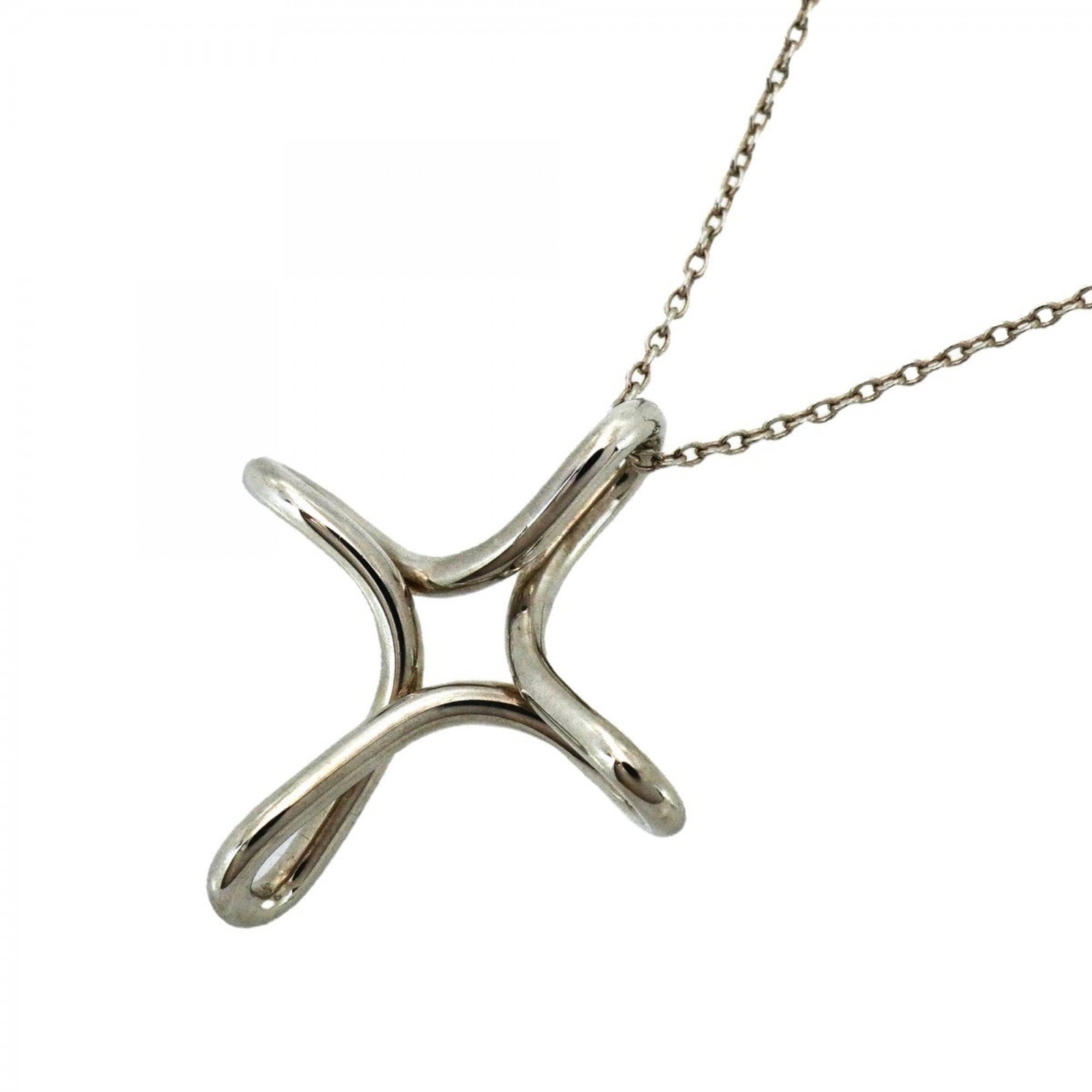 Tiffany & Co. Cross Necklace in Sterling Silver 925 for Women: Tiffany & Co. Cross Necklace in Sterling Silver 925 for Women Elegant and timeless, the Tiffany & Co. Cross Necklace in Sterling Silver 925 is a classic choice for women who appreciate understated sop