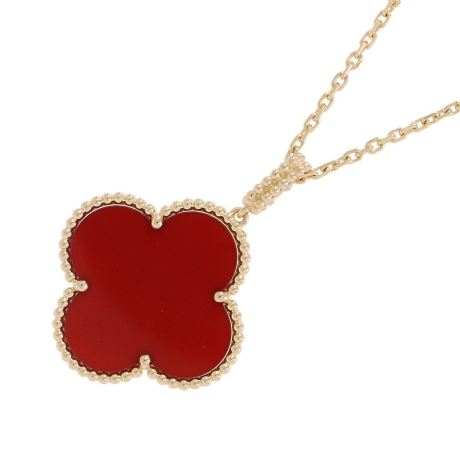 Van Cleef & Arpels Magic Alhambra Long Necklace in 18K Yellow Gold with Carnelian Motif.: Van Cleef & Arpels Magic Alhambra Long Necklace in 18K Yellow Gold with Carnelian Motif. Elevate your elegance with the iconic Van Cleef & Arpels Magic Alhambra Long Necklace, set in 18K yellow gold a