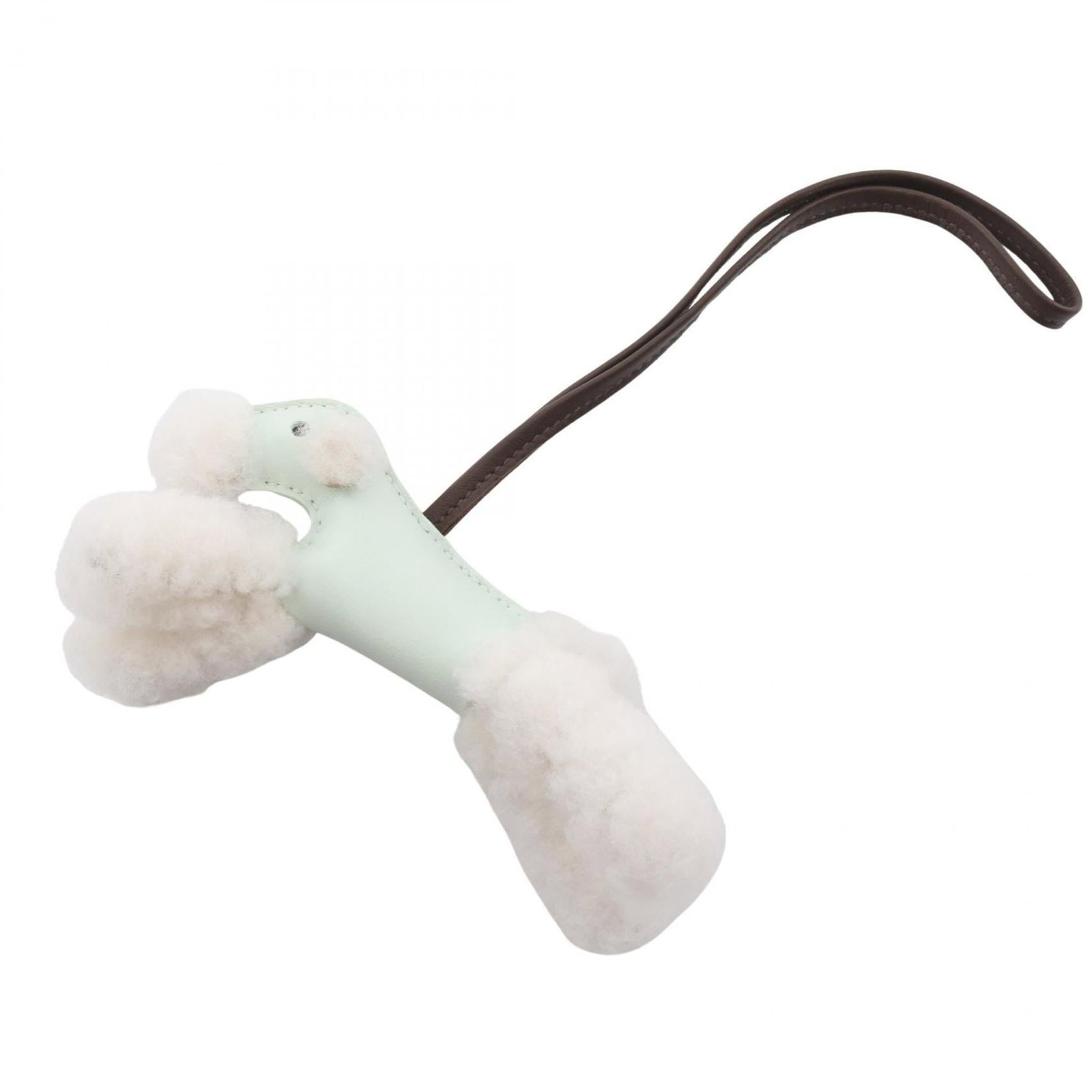 Hermes Agneau Milo Handbag Charm: Hermes Agneau Milo Handbag Charm A rare and coveted piece from the iconic Hermes brand, this Agneau Milo handbag charm boasts a rich, earthy tone in brown, green, or white, evoking the elegance of a l