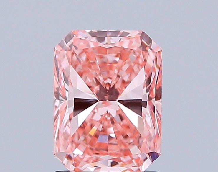 IGI Radiant 1.61ct Fancy Vivid Pink VVS2 Loose Lab Diamond: IGI Radiant 1.61ct Fancy Vivid Pink VVS2 Loose Lab Diamond Experience the rarity of a Fancy Vivid Pink diamond, one of the most coveted colors in nature. This exquisite 1.61ct lab-grown gem boasts exc