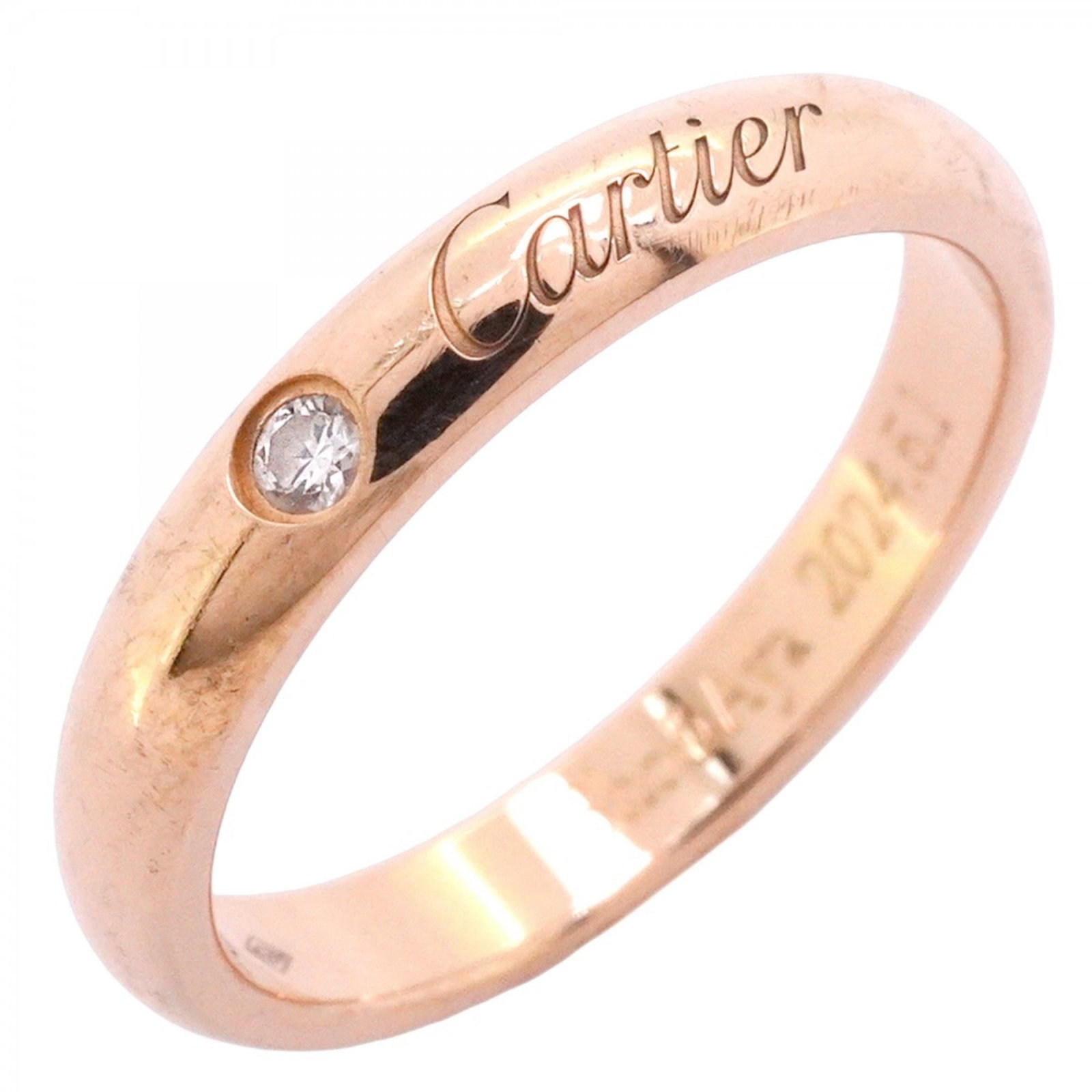 Pink Gold 18k Cartier Band Ring: Pink Gold 18k Cartier Band Ring A stunning Cartier band ring in 18k pink gold, adorned with a diamond stone, adds a touch of elegance to any outfit. With its classic design and luxurious material, thi