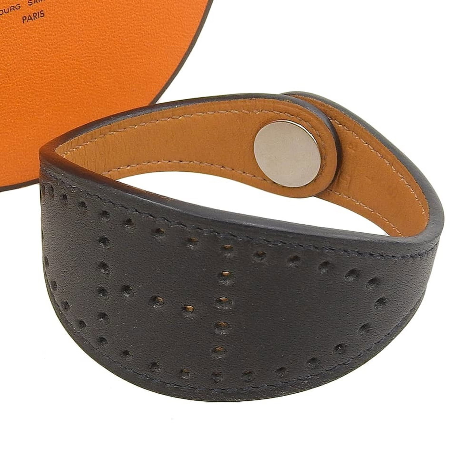 Hermes Leather Charm Bracelet: Hermes Leather Charm Bracelet A sleek and sophisticated accessory for the modern woman, this Herm?s leather charm bracelet boasts classic style with a touch of understated elegance. Made from high-qua