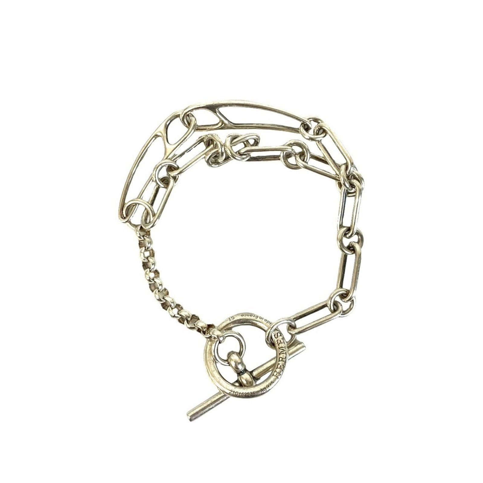 Hermes Silver 925 Charm Bracelet: Hermes Silver 925 Charm Bracelet A sleek and sophisticated accessory for the modern woman, this Hermes Silver 925 Charm Bracelet boasts a durable silver construction with a classic charm design that e