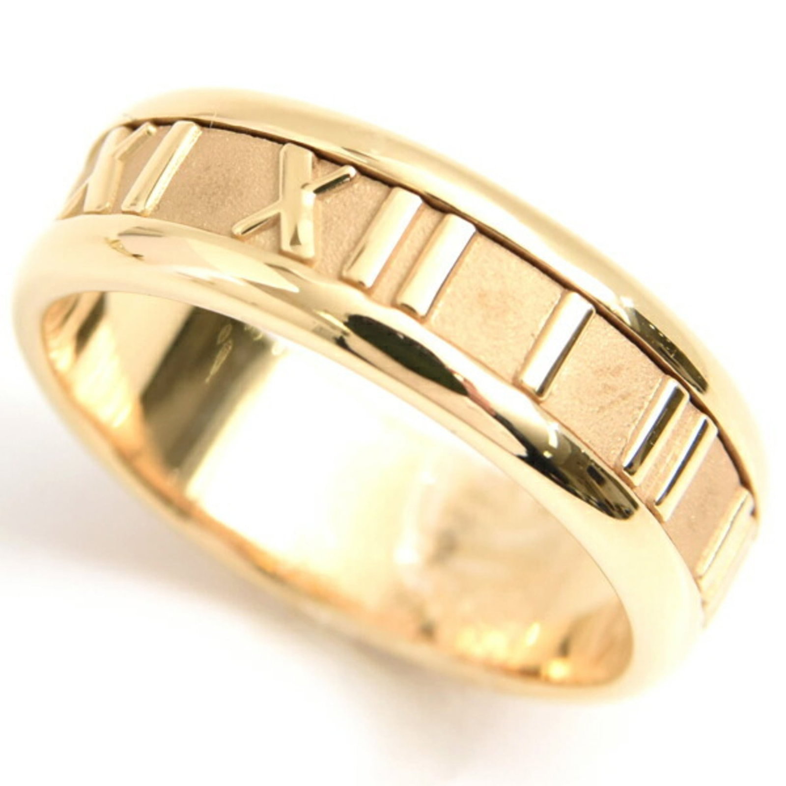 (18K) Tiffany Band Ring Yellow Gold: (18K) Tiffany Band Ring Yellow Gold A timeless piece of luxury, this 18K yellow gold Tiffany band ring exudes elegance and sophistication with its classic design and high-karat gold content. With a sl