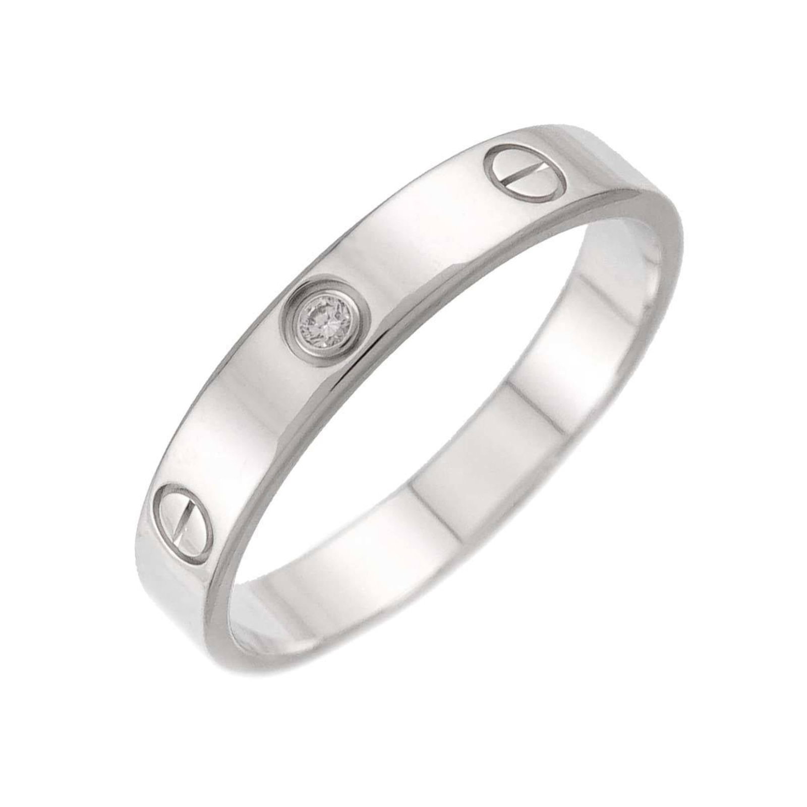 Cartier 18k White Gold Band Ring: Cartier 18k White Gold Band Ring A sleek and sophisticated Cartier band ring in 18k white gold, perfect for everyday wear, boasts a classic design with minimal signs of use. This pre-loved piece is ha