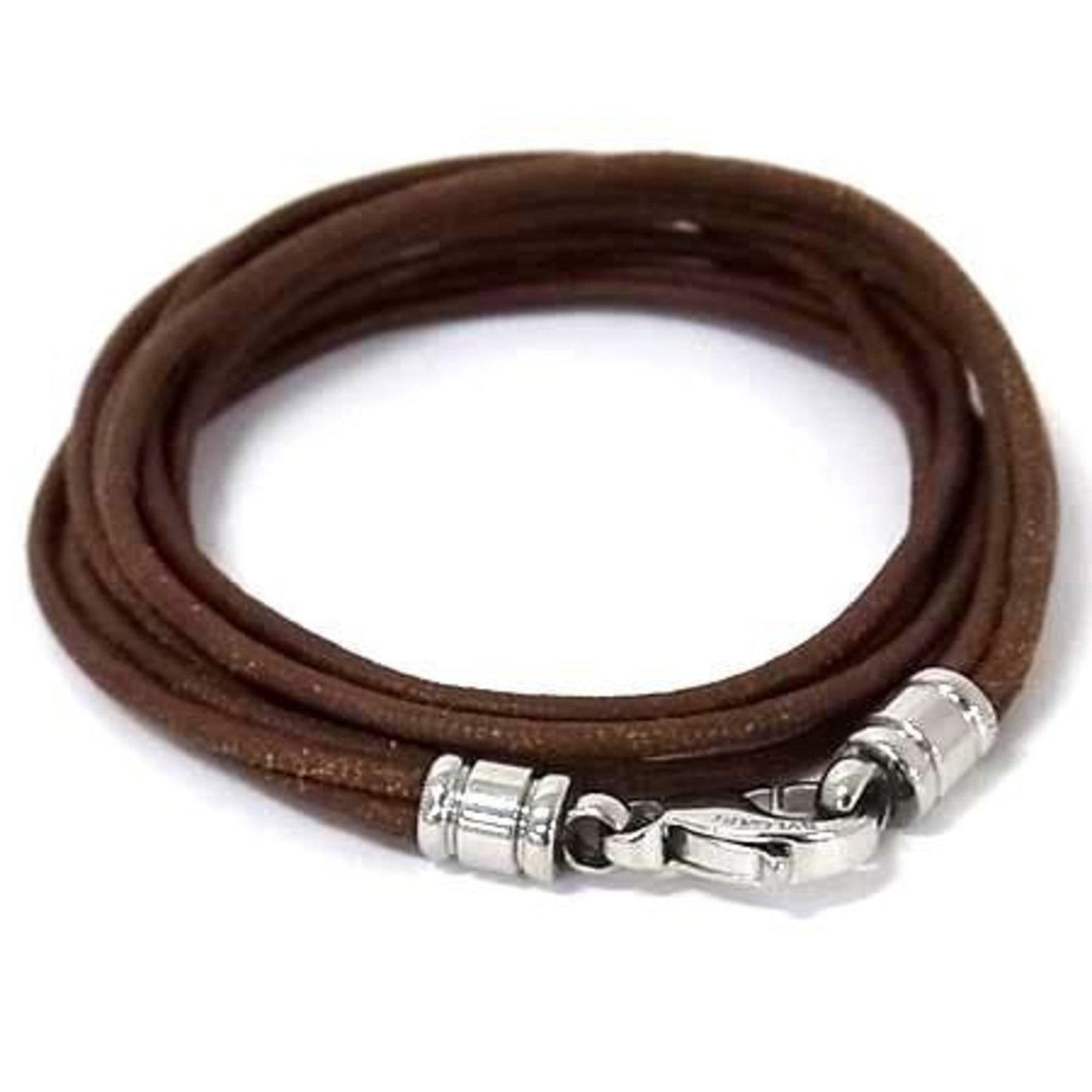 Bvlgari Leather Charm Bracelet: Bvlgari Leather Charm Bracelet A luxurious Bvlgari leather charm bracelet in rich brown tones, adding a touch of sophistication to any outfit. With its classic design and high-quality leather material
