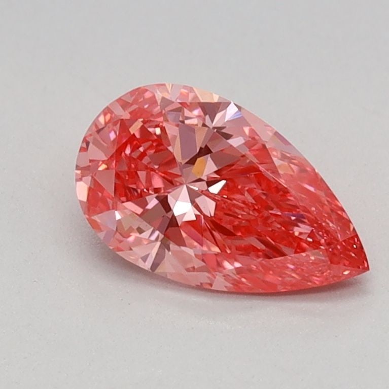 Loose Lab Diamond - IGI Pear 0.54ct Fancy Vivid Pink VVS2: Loose Lab Diamond - IGI Pear 0.54ct Fancy Vivid Pink VVS2 A truly one-of-a-kind gem, this 0.54ct lab-grown diamond boasts an extraordinary Fancy Vivid Pink hue that's sure to turn heads. Certified by