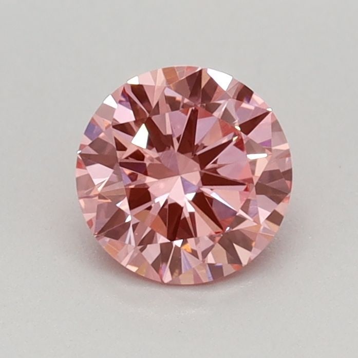 IGI Round 0.47ct Fancy Vivid Pink VVS2 Loose Lab Diamond: IGI Round 0.47ct Fancy Vivid Pink VVS2 Loose Lab Diamond Experience the rare beauty of a Fancy Vivid Pink diamond, one of the most coveted colors in nature. This exquisite 0.47ct lab-grown gem boasts